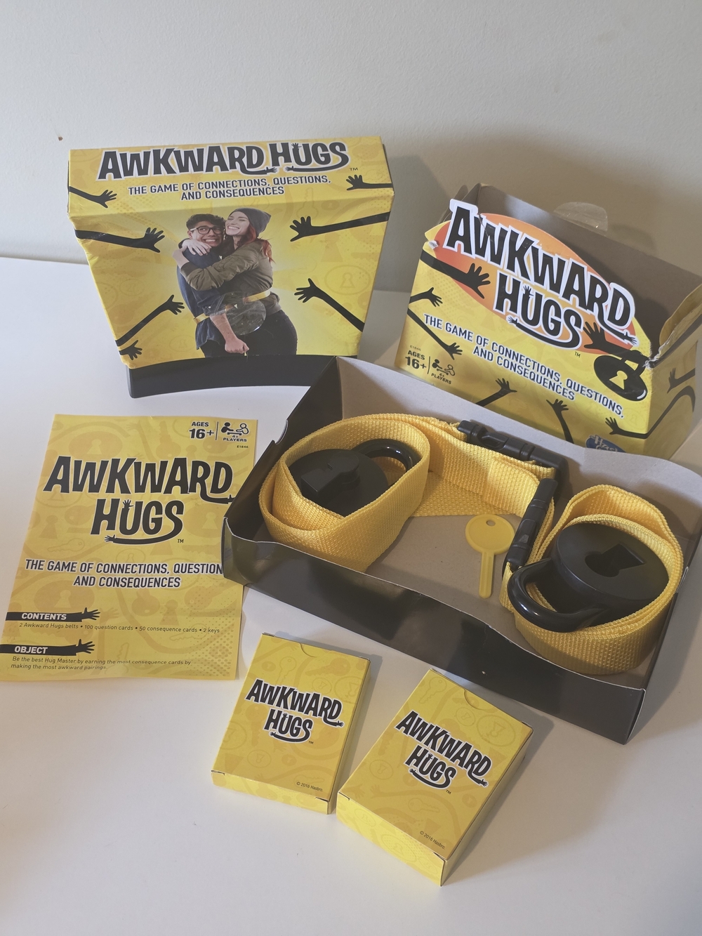 Hasbro Awkward Hugs Party Game - Yellow